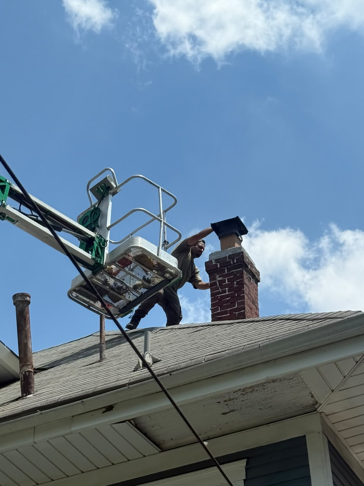 Boom Lift Cap Install — ChimCrew project in Upper Arlington, OH