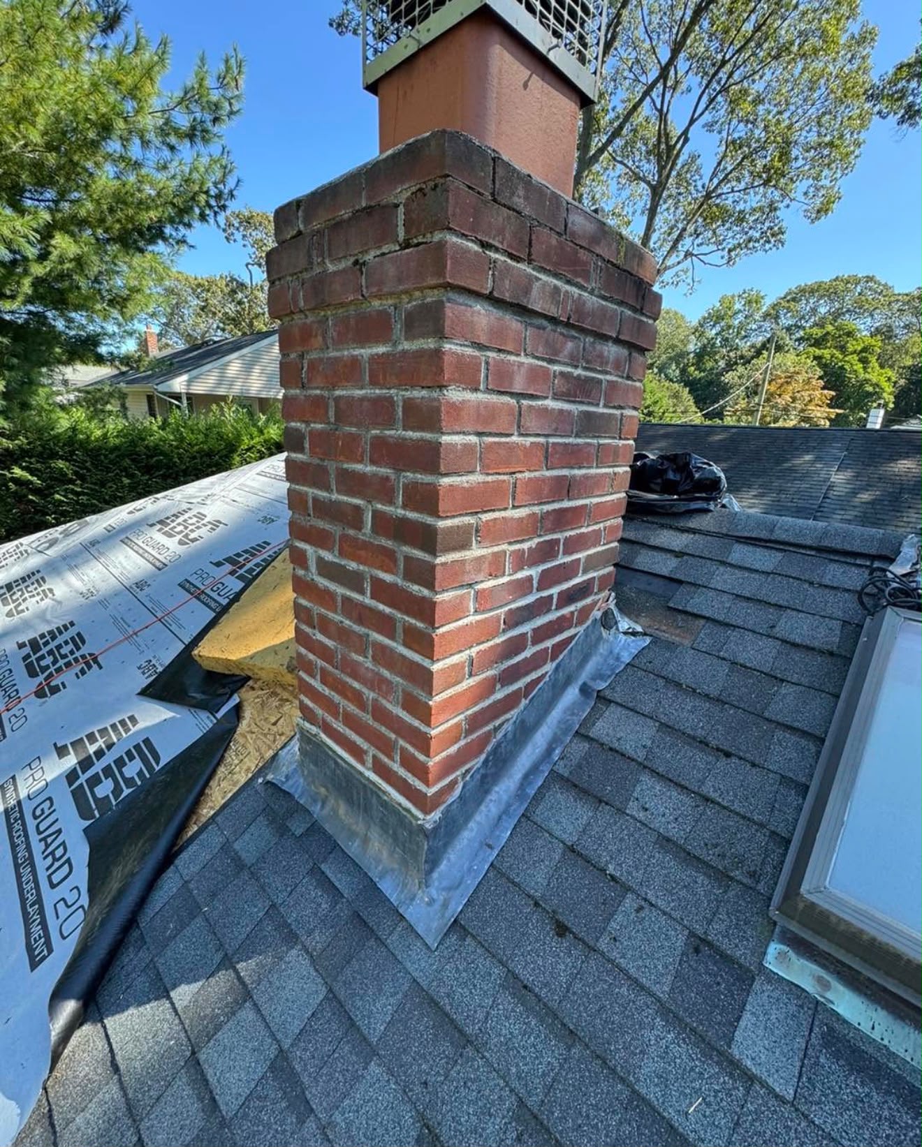 Before — Failing flashing — leak source at chimney base