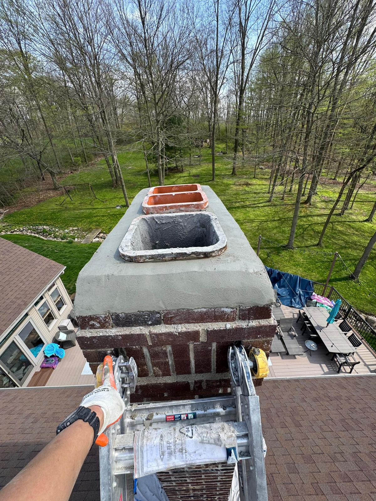 Chimney inspection on an Ohio rooftop
