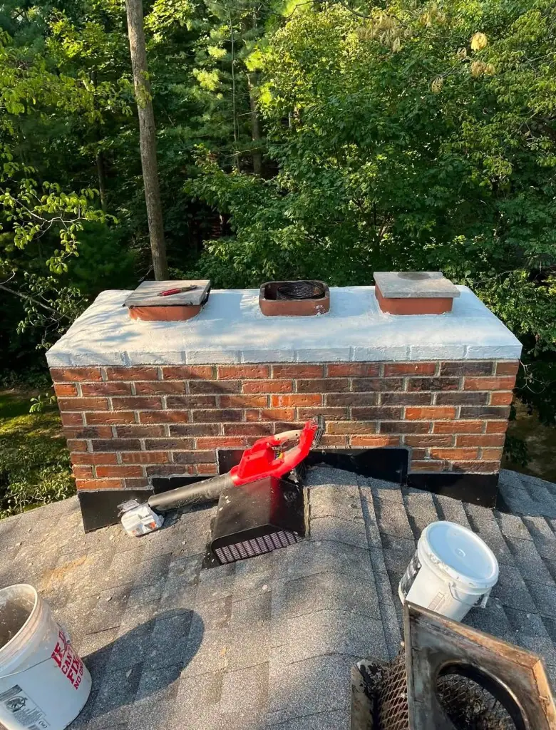 Triple Flue Crown Coat — Chimcrew - Chimney Sweep & Repair project in Columbus, OH